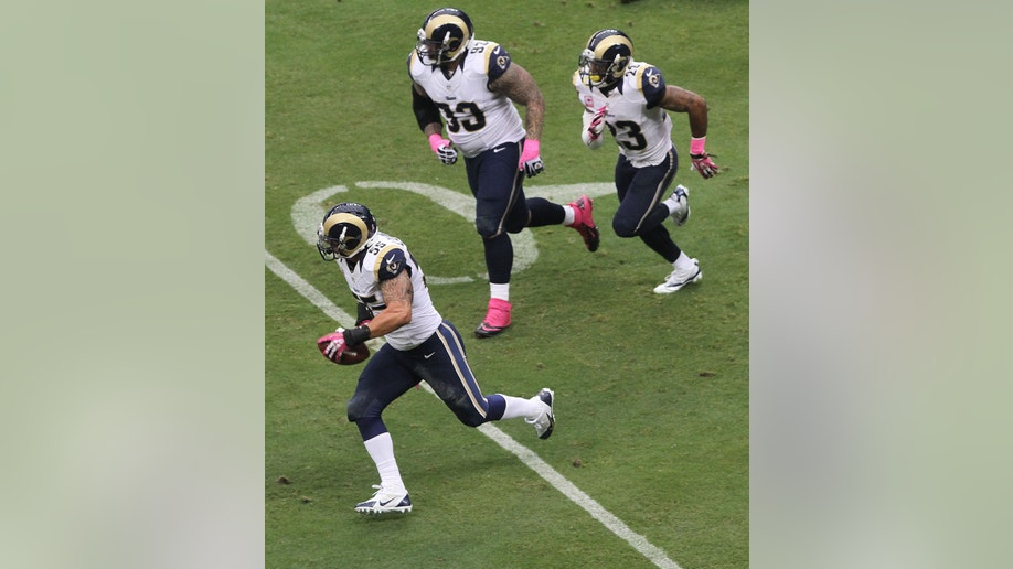 2011ea44-Rams Texans Football