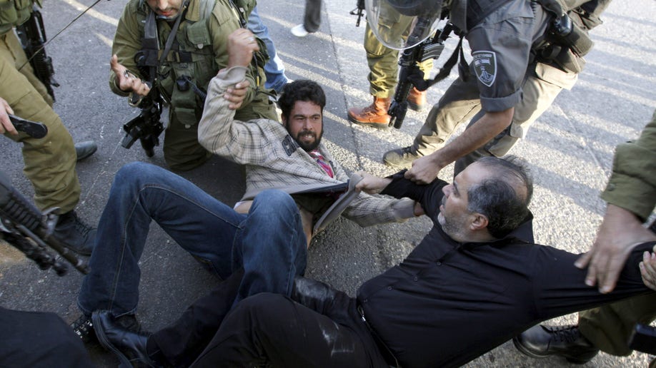 4ace1b35-Mideast Israel Palestinians