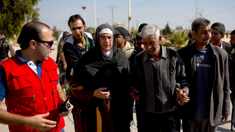 94ca3ac8-Mideast Syria Controversial Nun