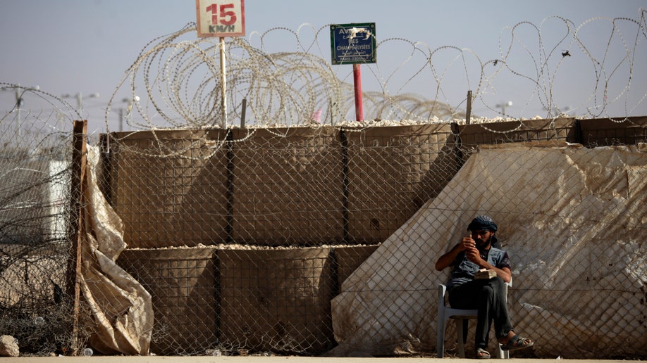 9a986f66-Mideast Jordan Syria Recruiting the Rebels