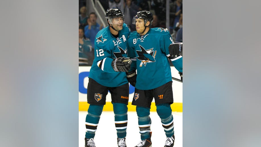 15972925-Coyotes Sharks Hockey