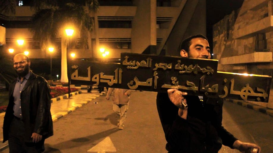 Mideast Egypt State Security Return