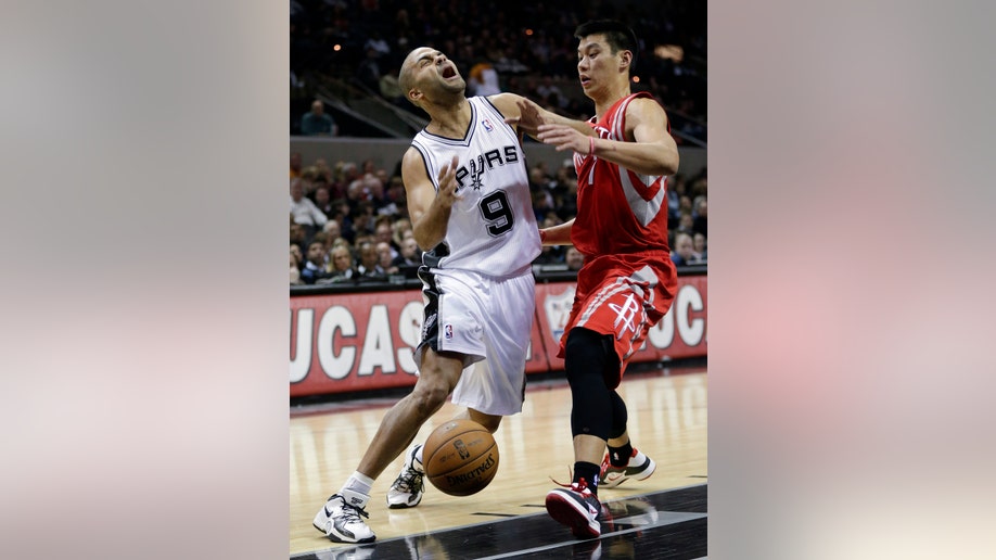 5239d573-Rockets Spurs Basketball