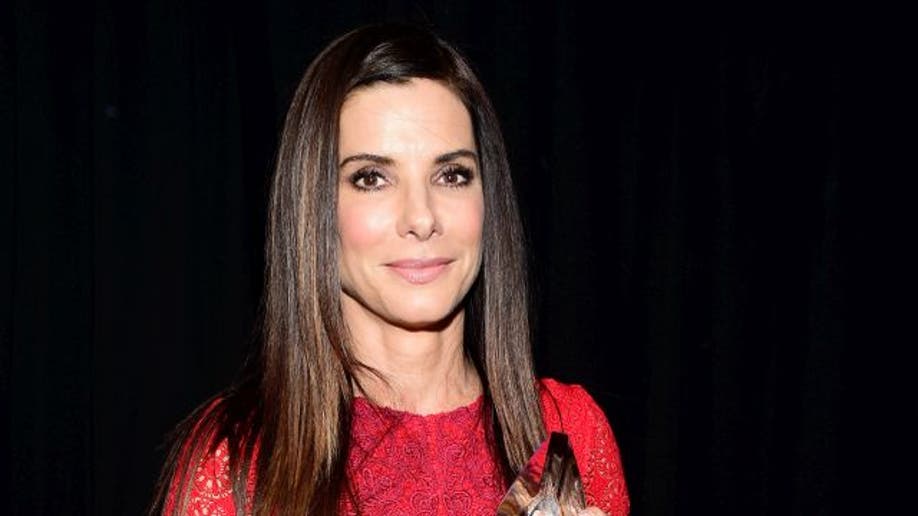 LOS ANGELES, CA - JANUARY 06: Actress Sandra Bullock, winner of the award for Favorite Movie Actress, attends the People's Choice Awards 2016 at Microsoft Theater on January 6, 2016 in Los Angeles, California. (Photo by Frazer Harrison/Getty Images for The People's Choice Awards)