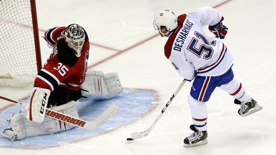 7d2e0a44-Canadiens Devils Hockey
