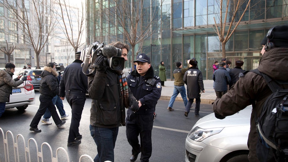 China Journalists Under Pressure