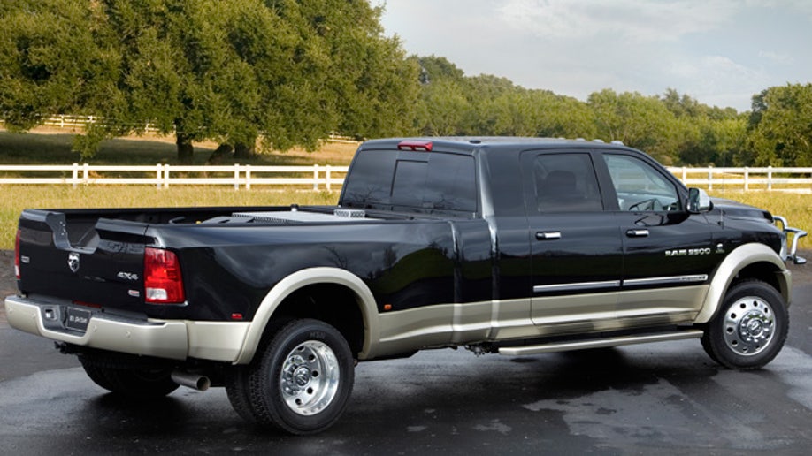 577945f7-Ram Long-Hauler Concept. The Ram Long-Hauler Concept is one-off truck built on a Ram 5500 Chassis Cab platform with a Mega Cab, 8-foot pickup bed and mid-ship fuel tank.