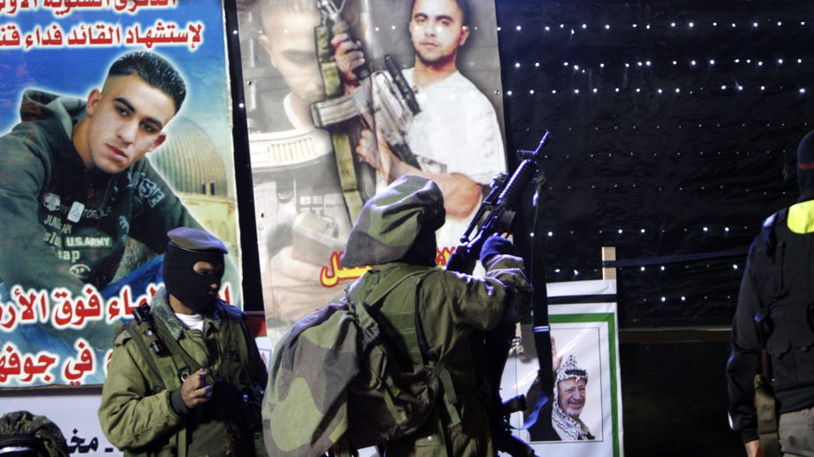 cac12208-Mideast Israel Palestinians