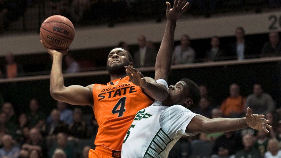 APTOPIX Oklahoma St South Florida Basketball