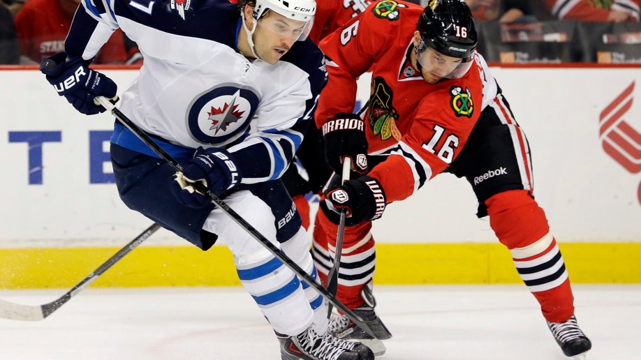 27fe874b-Jets Blackhawks Hockey