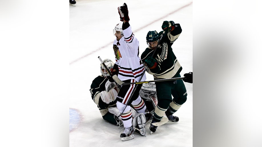 284b5529-Blackhawks Wild Hockey