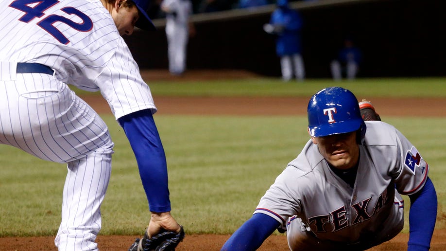2a221358-Rangers Cubs Baseball