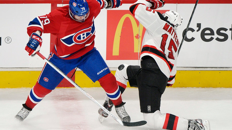 5d59c073-Devils Canadiens Hockey