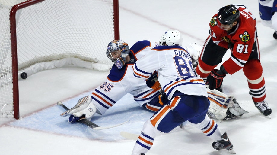 a1c9d37e-Oilers Blackhawks Hockey