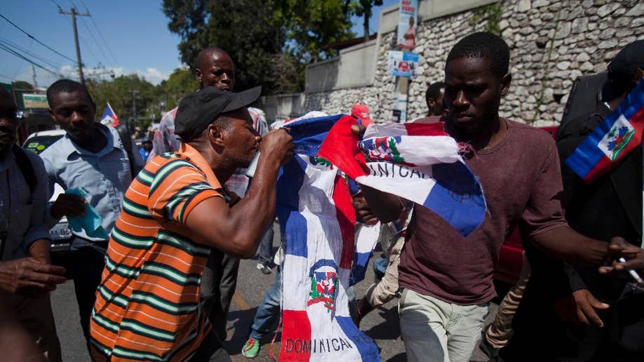 Thousands Of Haitian Protesters Decry Violence Against Countrymen In ...