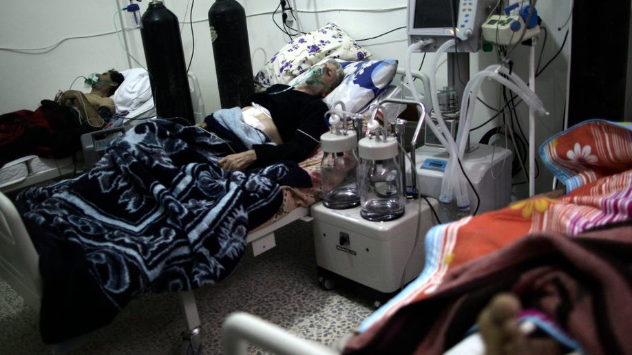 f3dbffac-Mideast Syria War Wounded