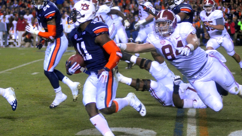 78c82ca9-Alabama Auburn Football