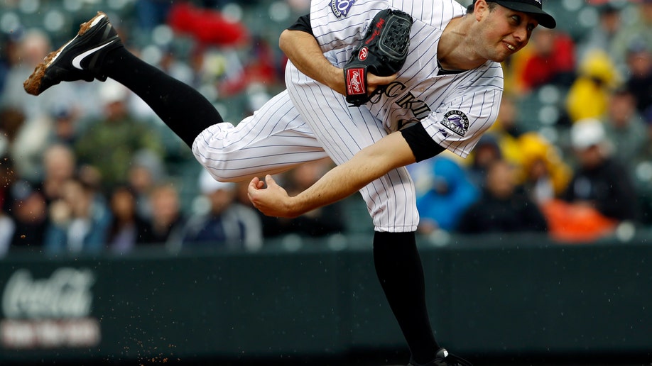 1f019829-Yankees Rockies Baseball