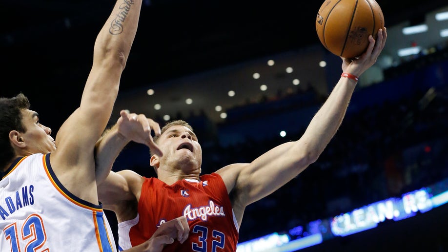 ea573e48-Clippers Thunder Basketball