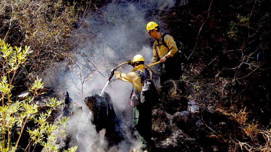 Firefighters Make Big Jumps Toward Surrounding Southern California ...