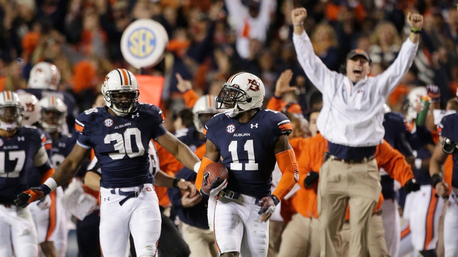 APTOPIX Alabama Auburn Football