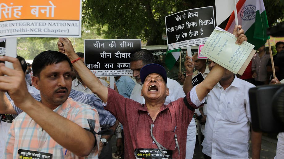 e82f5587-India China Protest