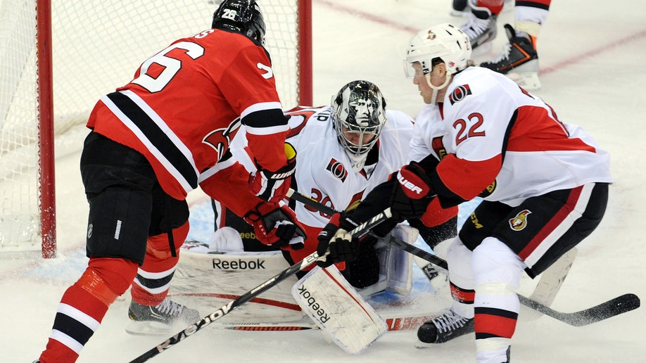 a48986e7-Senators Devils Hockey