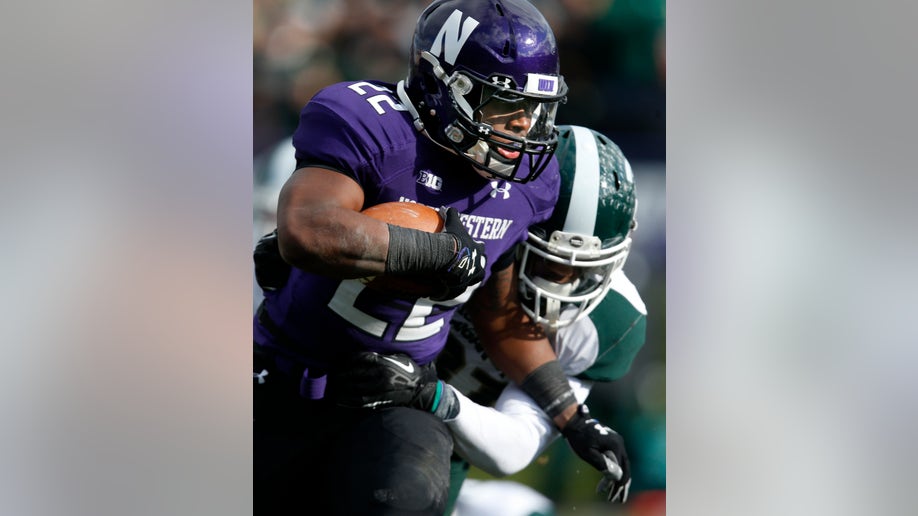 b74540ee-Michigan St Northwestern Football