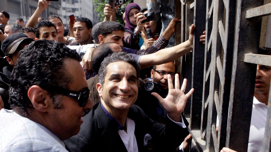 68e360c7-Mideast Egypt Satirist Returns