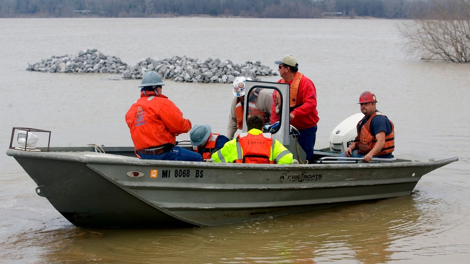 cb2261b4-Oil Barges Hit Bridge