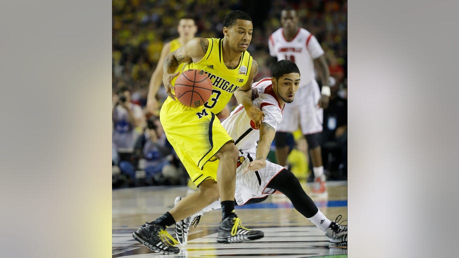 6729cf5e-NCAA Final Four Michigan Louisville Basketball