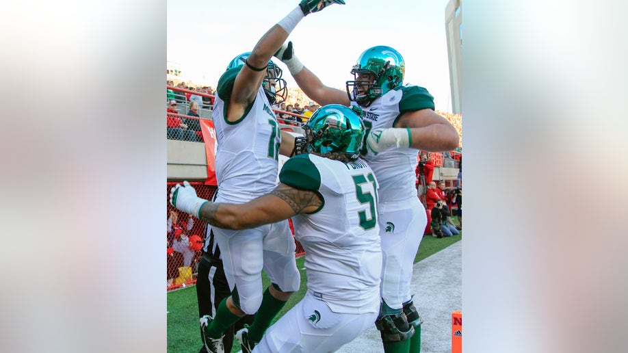 a7bf5e6a-Michigan St Nebraska Football