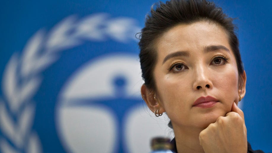 6d1eae36-Kenya China Ivory