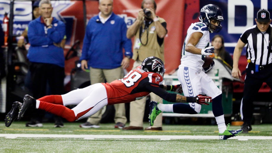 3b6d9c97-Seahawks Falcons Football