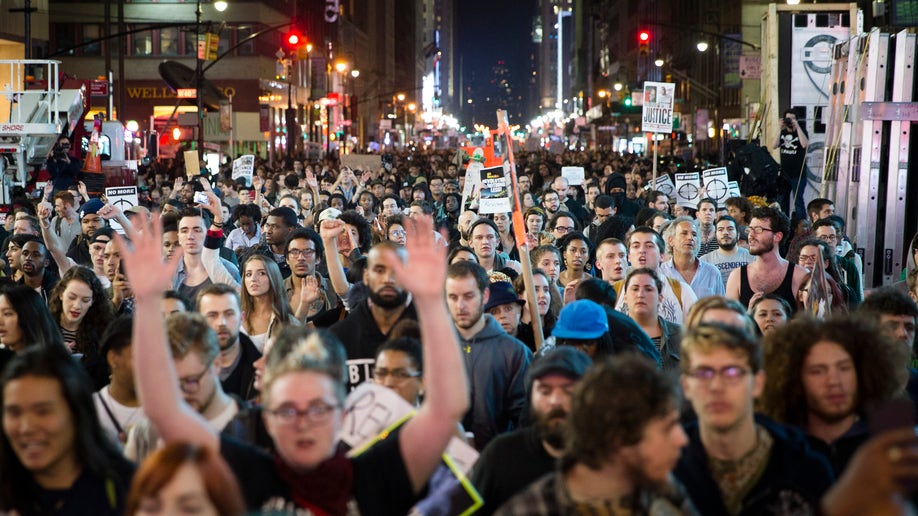 In Ferguson, Missouri, and across U.S., thousands rally to protest