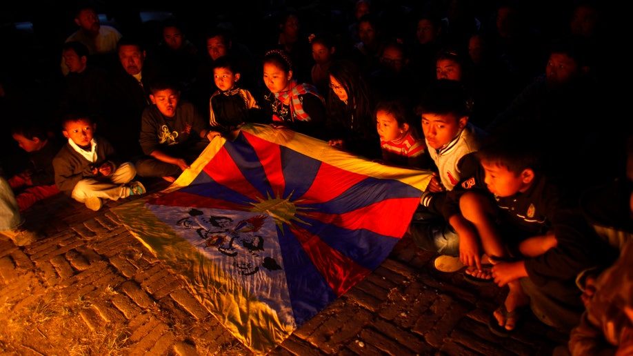 4224160c-Nepal Tibetan Protestor