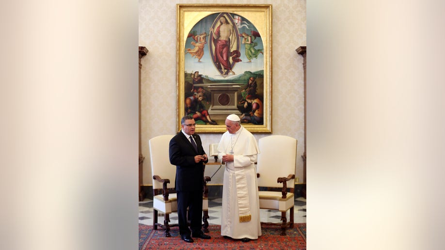 1f99712b-Vatican Pope Salvador