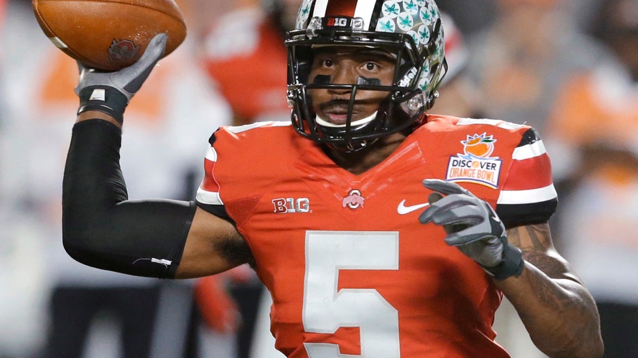 85186d5c-Ohio St Wrapup Football
