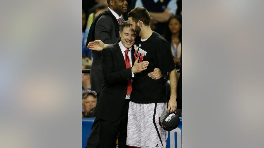 9e23f7e1-NCAA Final Four Michigan Louisville Basketball