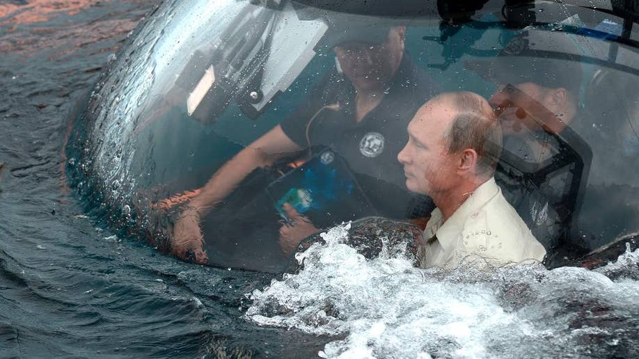 Putin Shows His Love For Stunts By Riding To The Bottom Of The Black Sea To See Ancient Ship