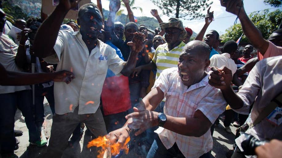 Thousands Of Haitian Protesters Decry Violence Against Countrymen In 