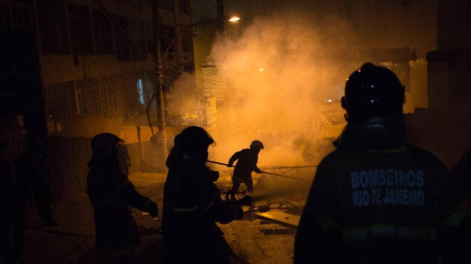 Violence Spills Out Of Rio Slum Near Future Olympic Venues Just Ahead