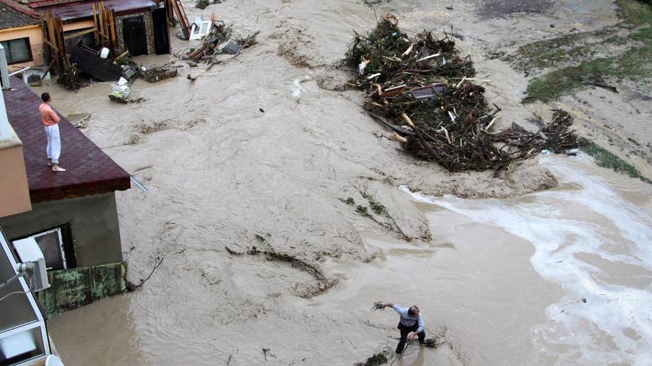 At least 10 people die in flooding in eastern Bulgaria after torrential