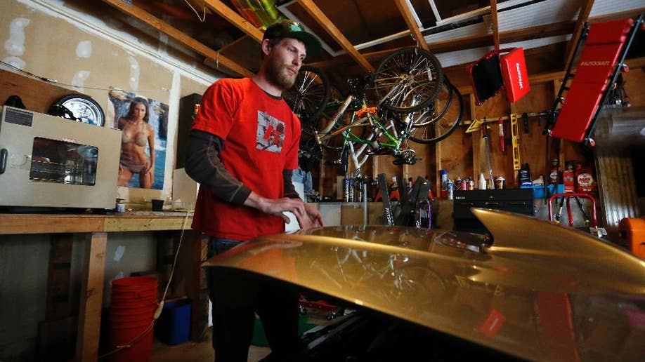 Father of Colorado theater shooting victim finds strength in officer