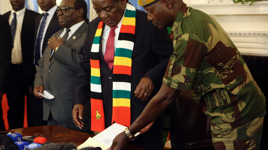 As Zimbabwe's Leader Preaches A New Era, Military A Concern