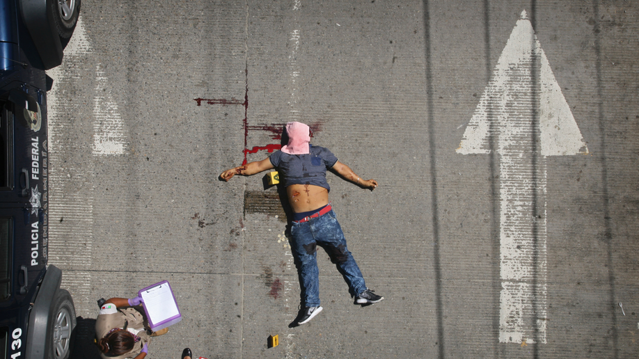 mexico bodies hanging from overpass