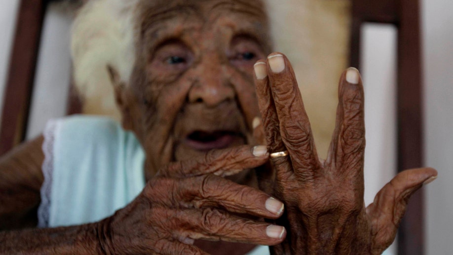 APTOPIX Cuba Old Woman