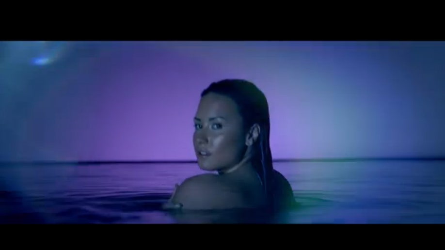 Demi Lovato Goes Skinny Dipping In Her New Neon Lights Music Video