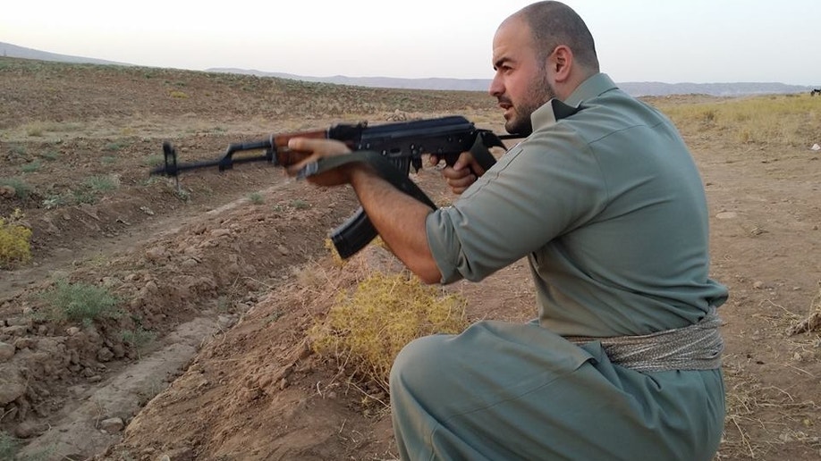 66b012c5-Europe Kurdish Fighter