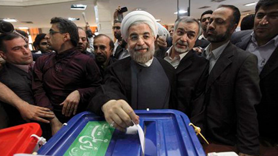 b9be7a24-Mideast Iran Election